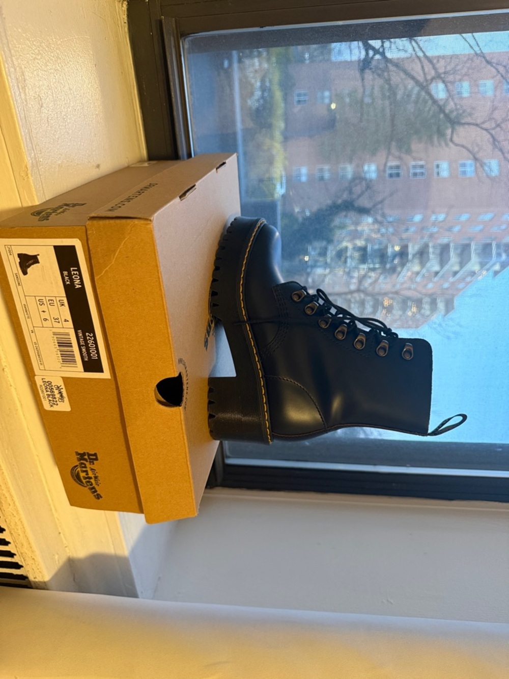 Dr. Martens Black Leather Lug Heel Ankle Boot with Yellow Stitching
